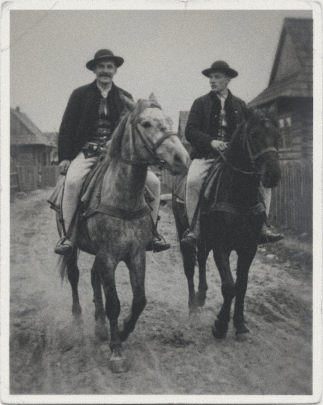 Retouched family-history illustration: riding in the village